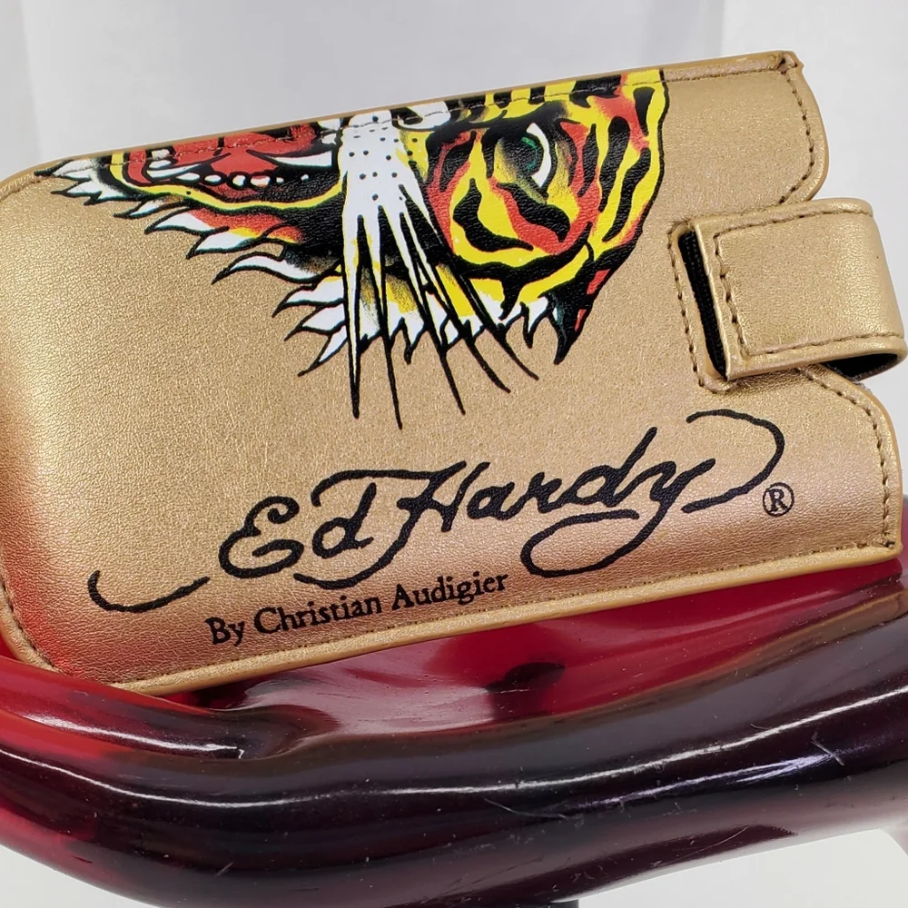 ED HARDY GOLD UNIVERSAL CELL PHONE CASE WITH LEATHER PULL & SNAP CLOSURE. $48.00